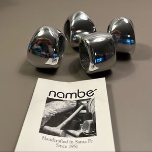 Nambé- set of 4 napkin rings / holders